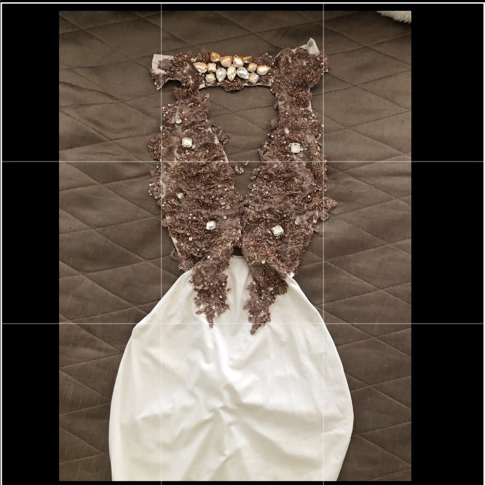 White dress with crystals worn once.
